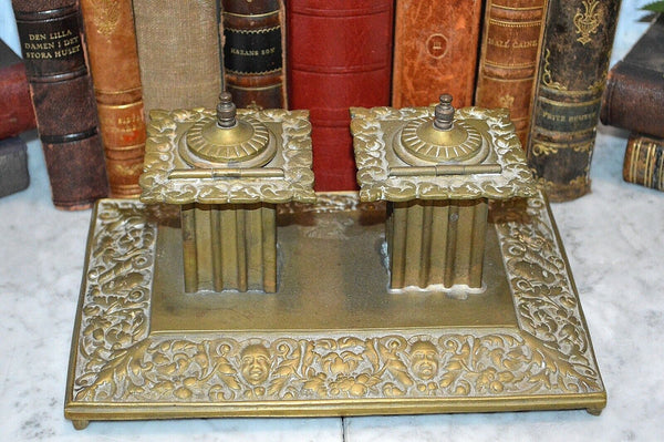Antique English Brass Gothic Double Inkwell Figural Faces Pen Rest