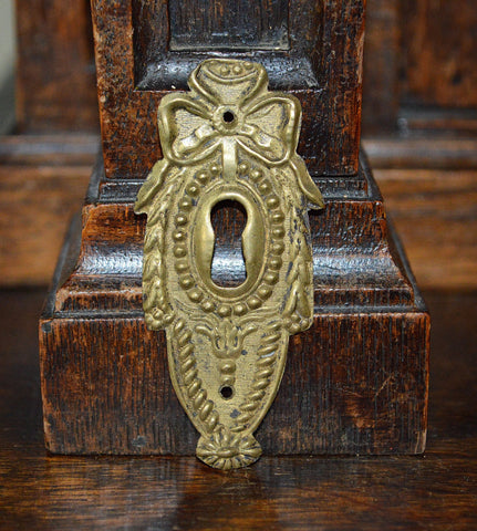Antique French Escutcheon Brass Keyhole Bow Beaded Hardware - Antique Flea Finds - 1